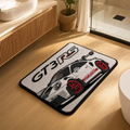 THRESHOLD 01 WIDE ANGLE car entry mat with a white track car
